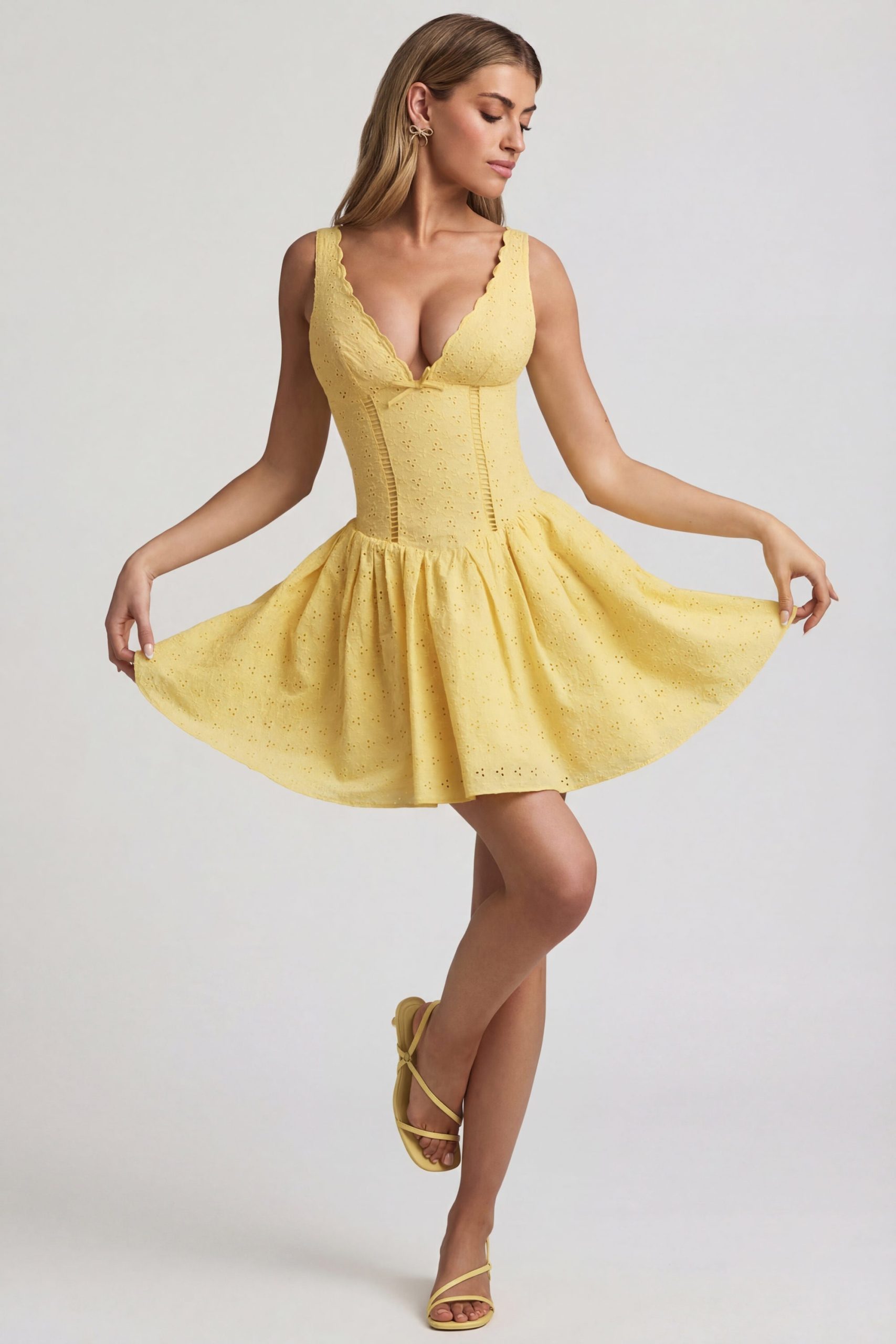 Broderie Anglaise Bow-Detail A-Line Mini Dress in Pastel Yellow - Image 5