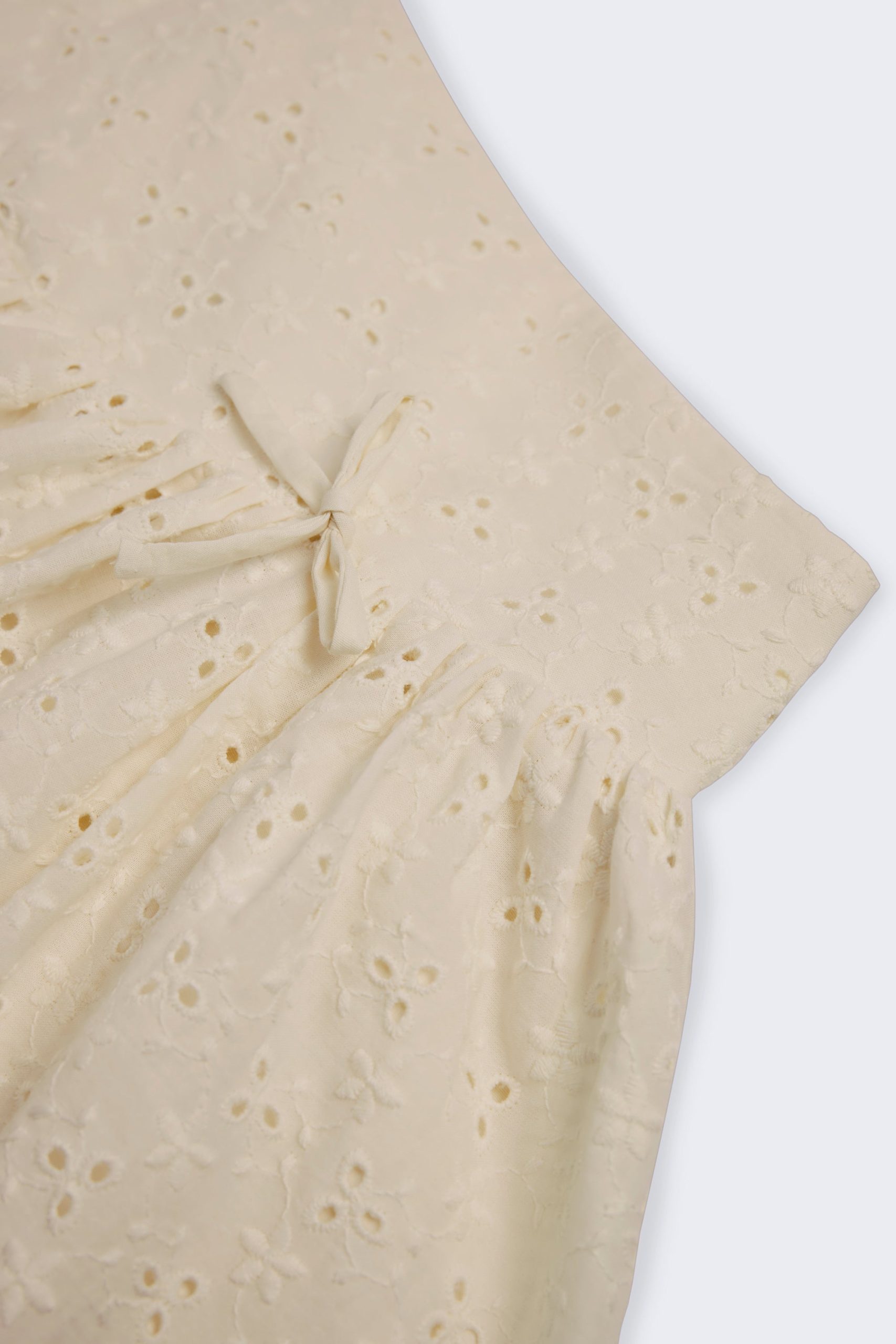 Bow-Detail Broderie Anglaise Mini Skirt in Ivory - Image 4