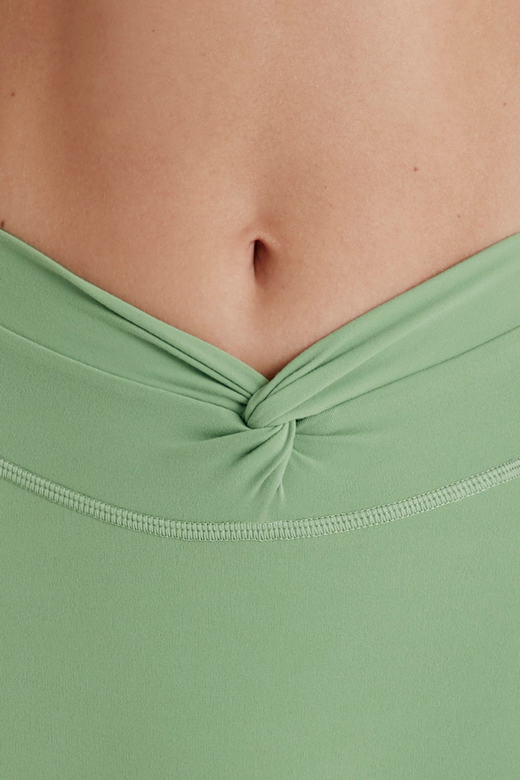 Soft Active Twist-Front Mini Shorts in Green - Image 5