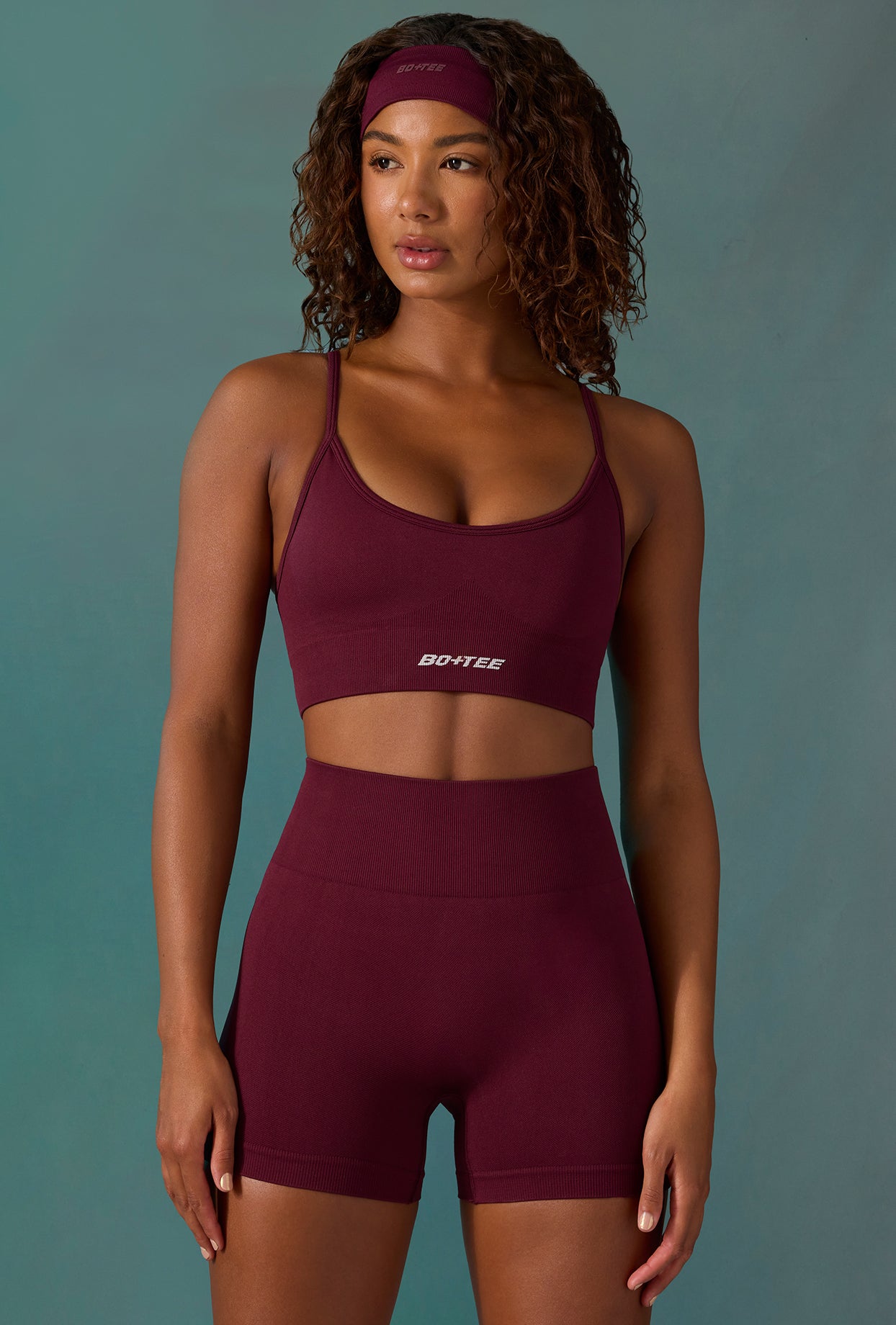 Super Sculpt Seamless Mini Shorts in Plum - Image 5