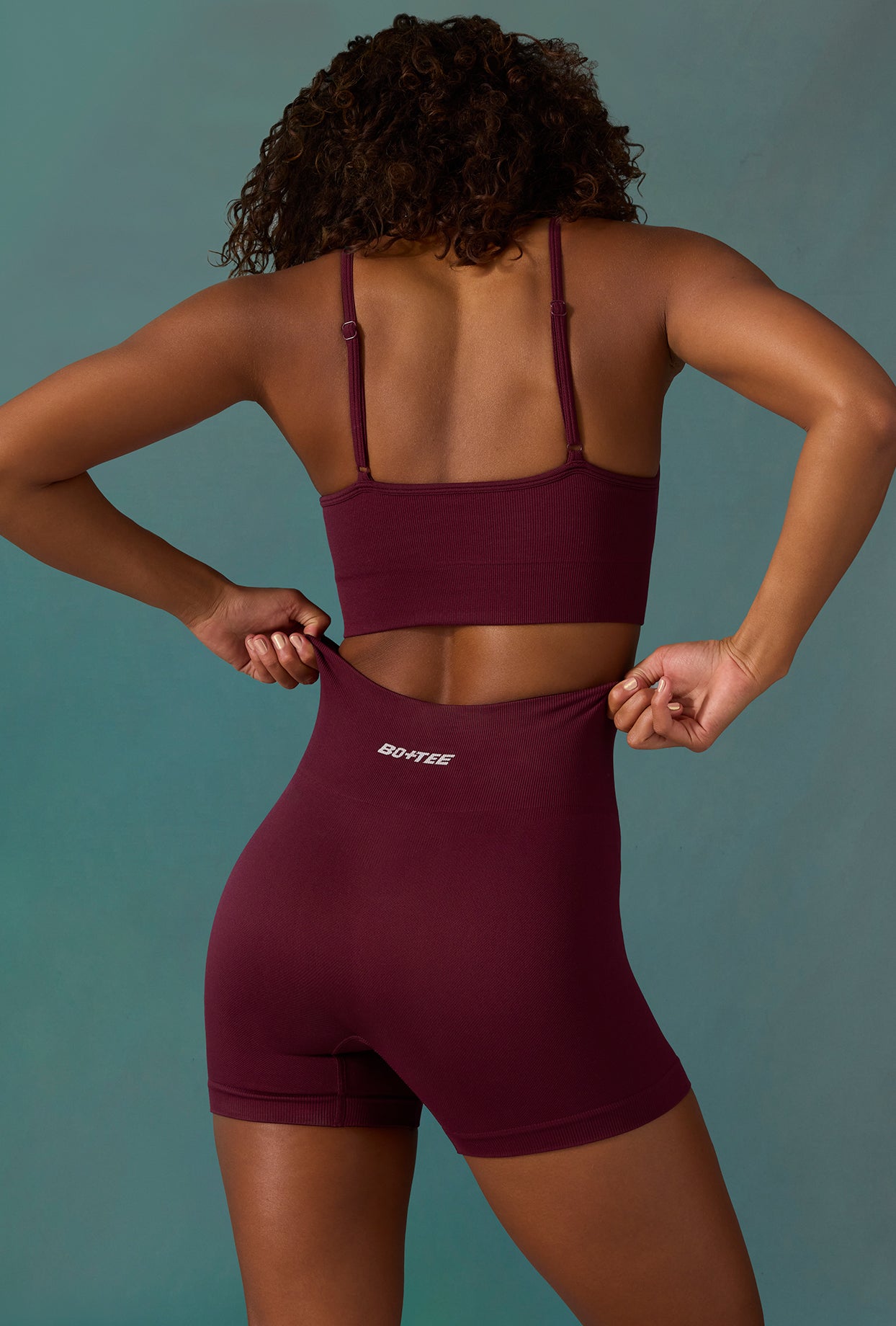Super Sculpt Seamless Mini Shorts in Plum - Image 2