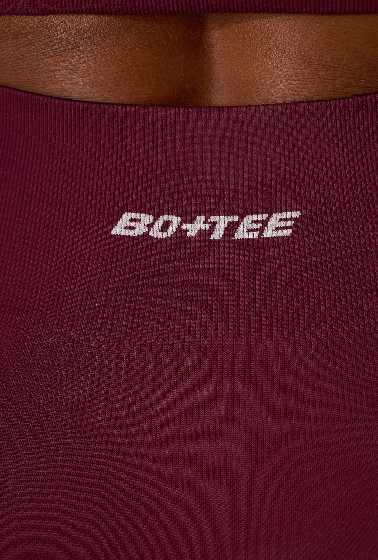 Super Sculpt Seamless Mini Shorts in Plum - Image 4