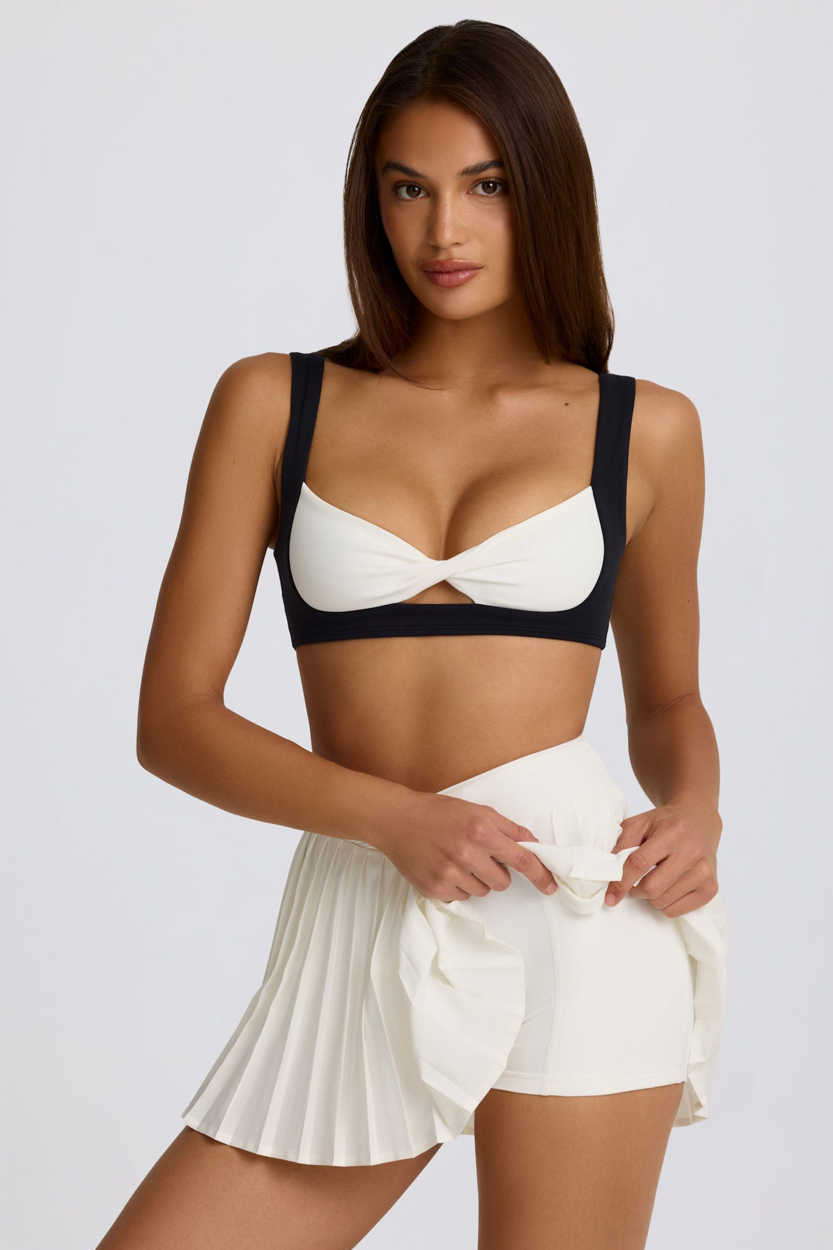 Soft Active Crossover Pleated Mini Skort in Ivory - Image 4