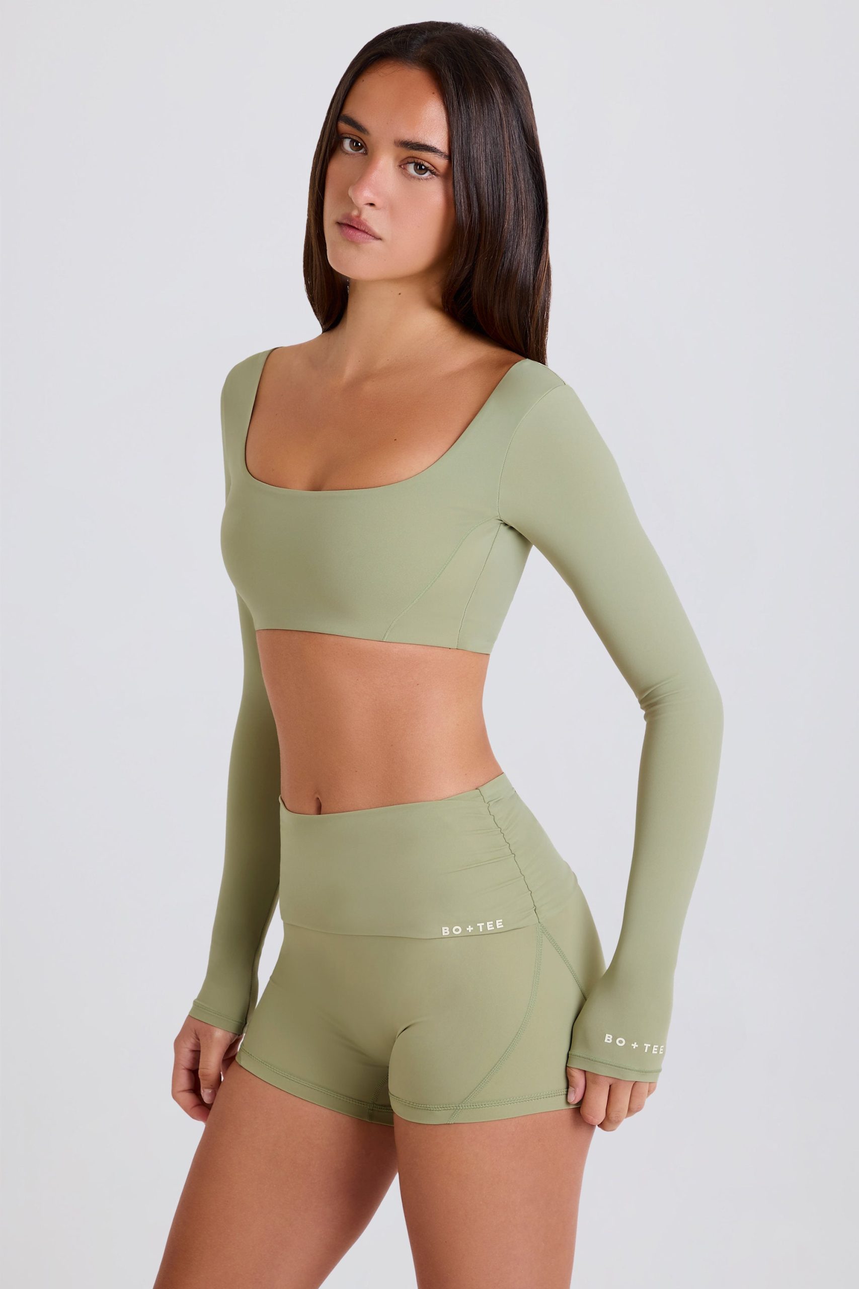 Four-Way Stretch Foldover Mid-Rise Mini Shorts in Matcha - Image 2