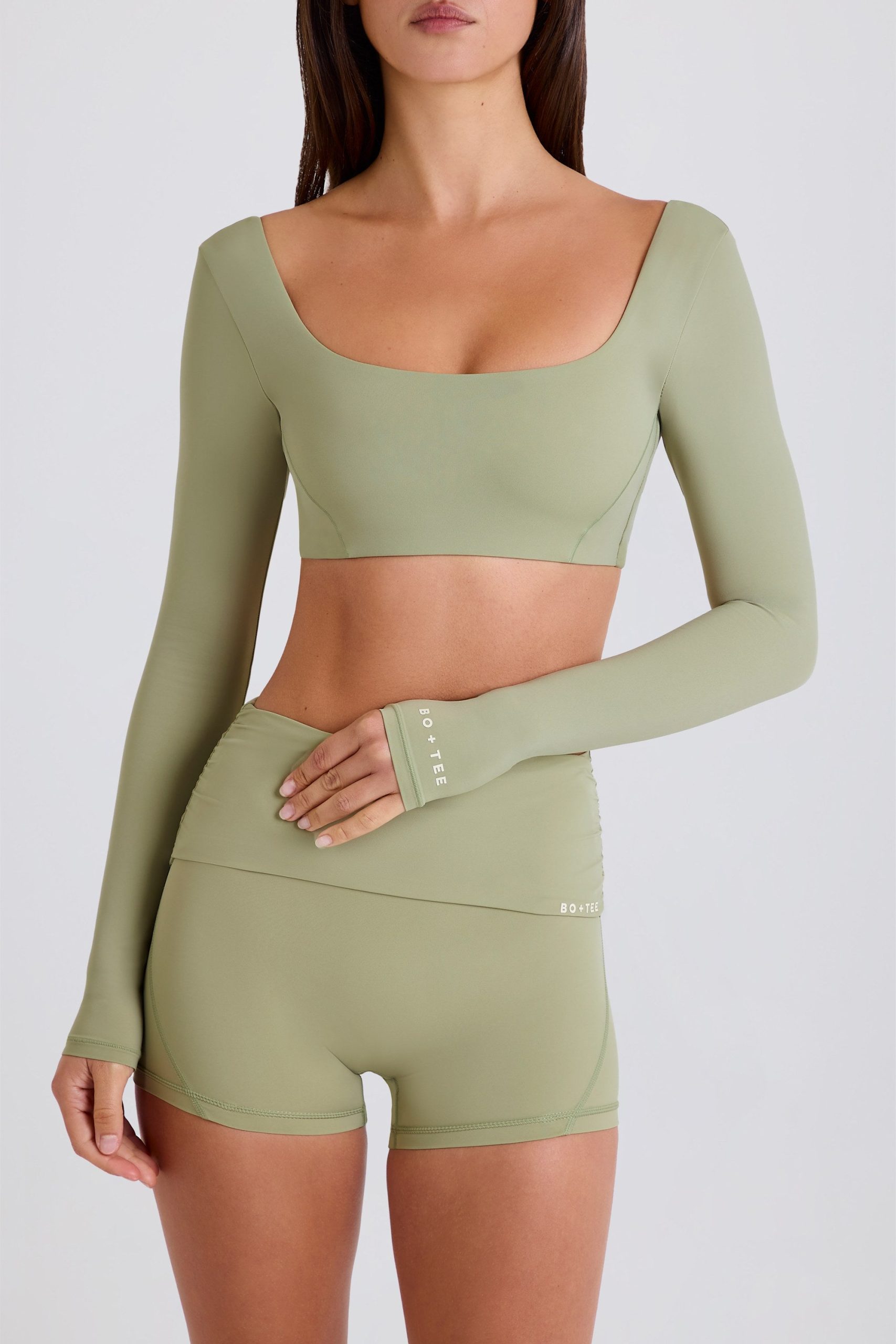 Four-Way Stretch Foldover Mid-Rise Mini Shorts in Matcha - Image 4