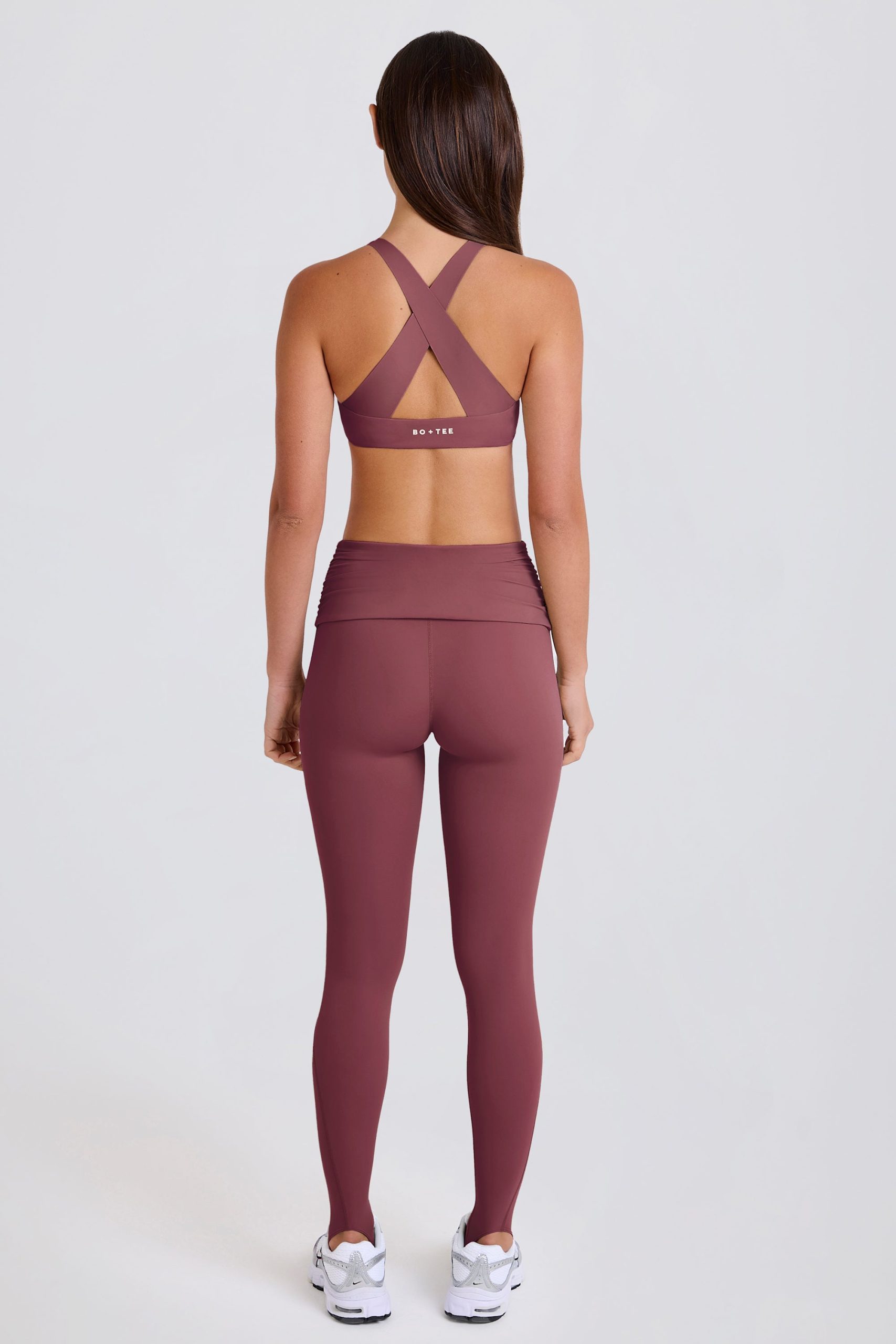 Four-Way Stretch Foldover Mid-Rise Stirrup Leggings in Acai - Image 4
