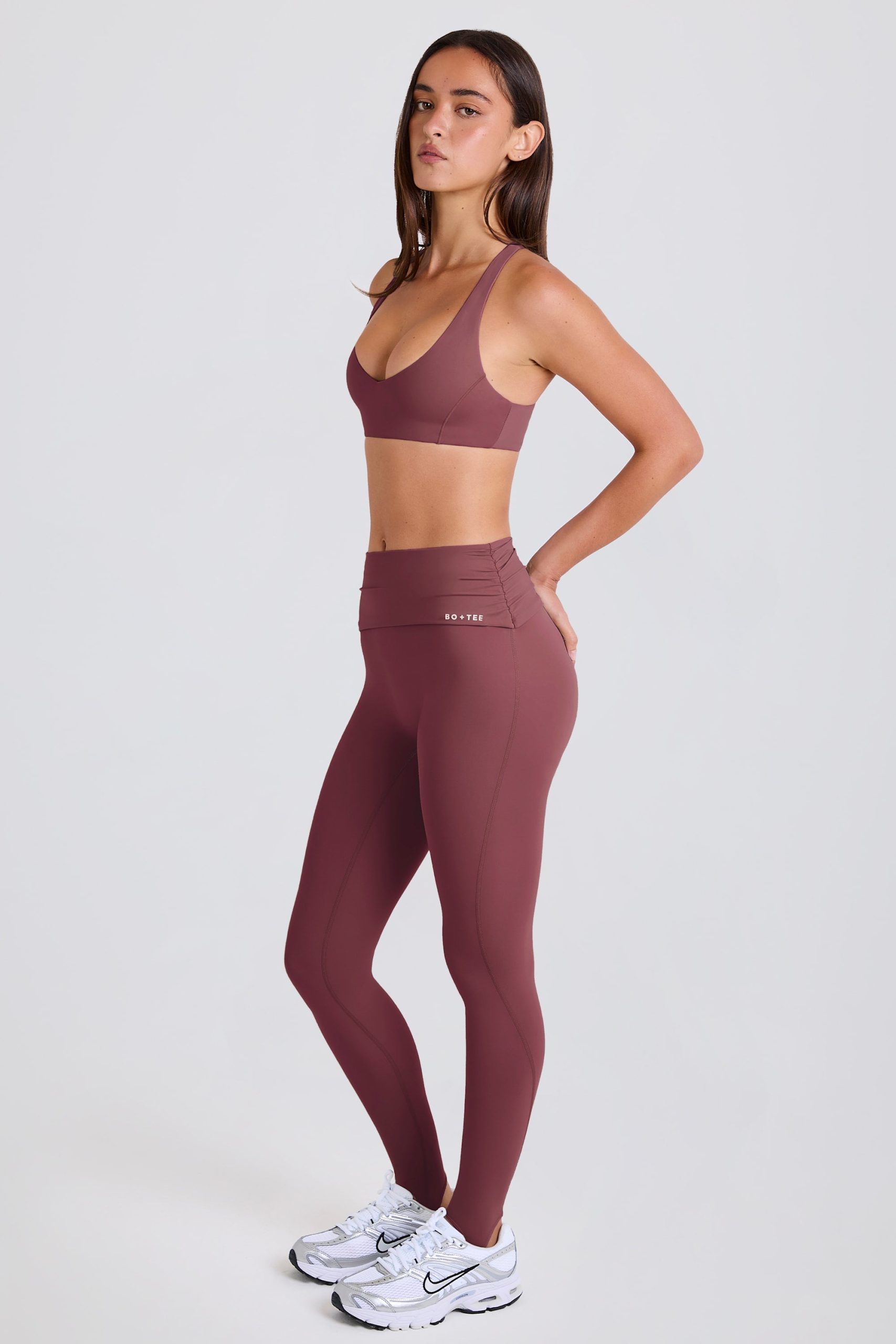 Four-Way Stretch Foldover Mid-Rise Stirrup Leggings in Acai - Image 5