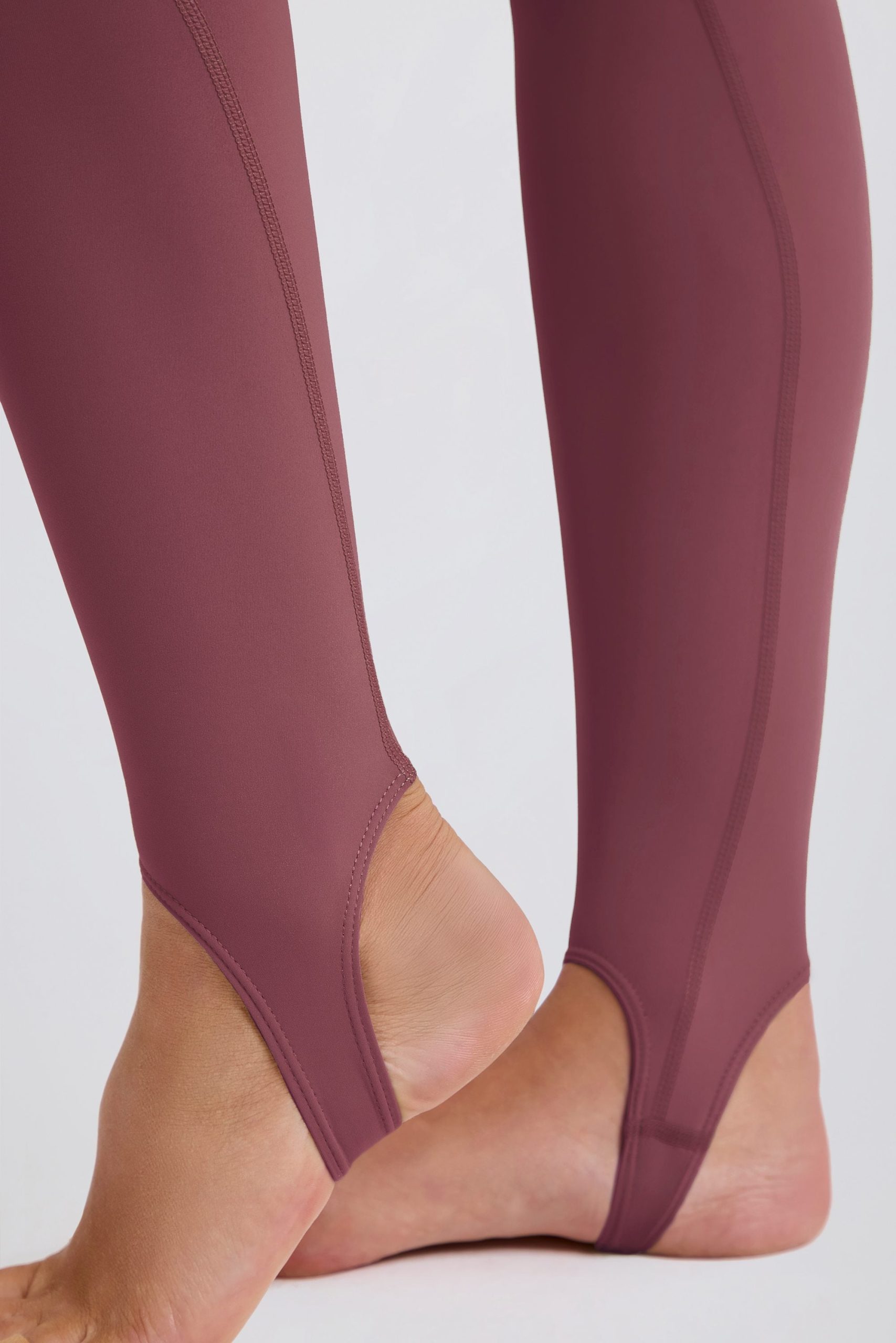 Four-Way Stretch Foldover Mid-Rise Stirrup Leggings in Acai - Image 6