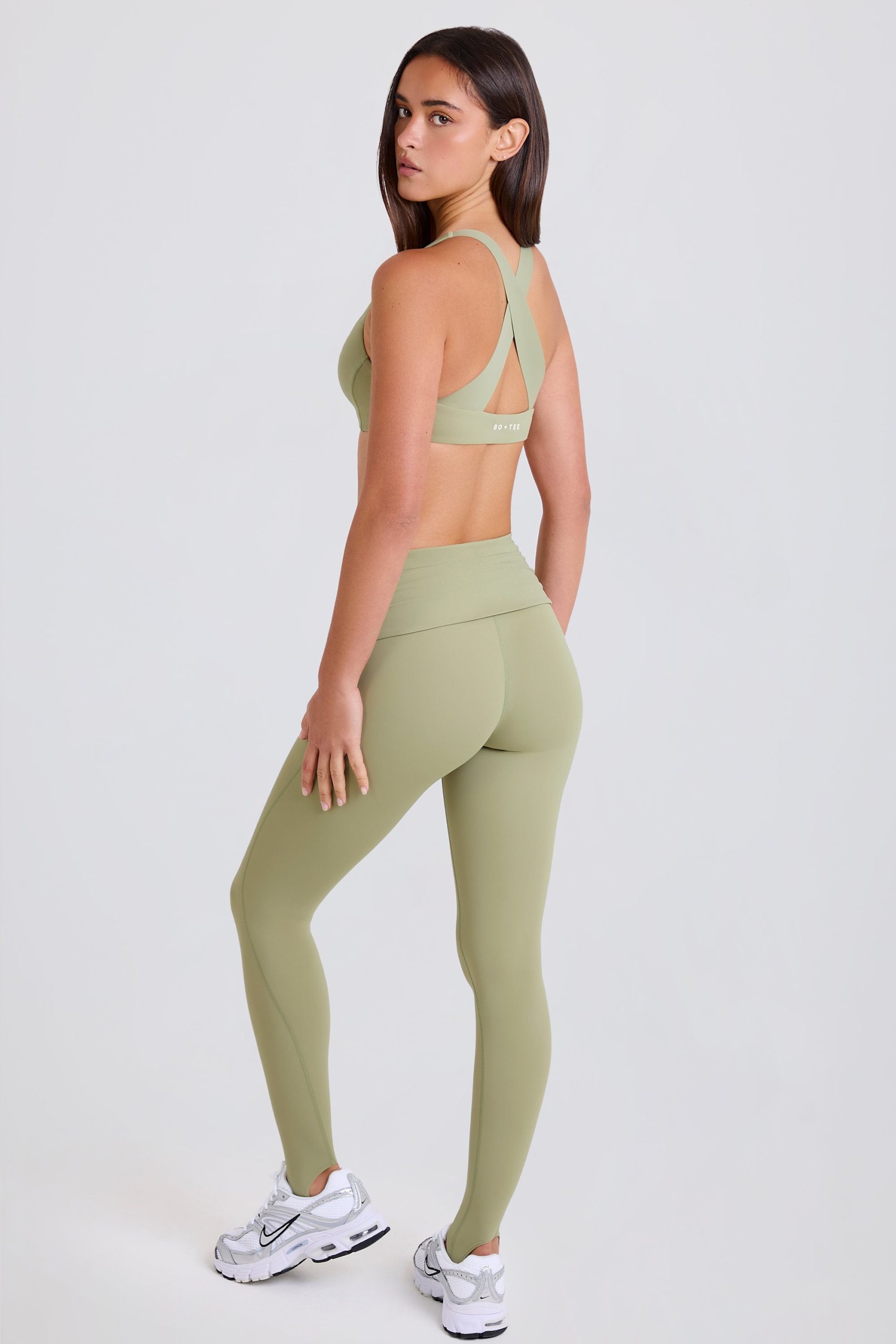 Four-Way Stretch Foldover Mid-Rise Stirrup Leggings in Matcha - Image 2