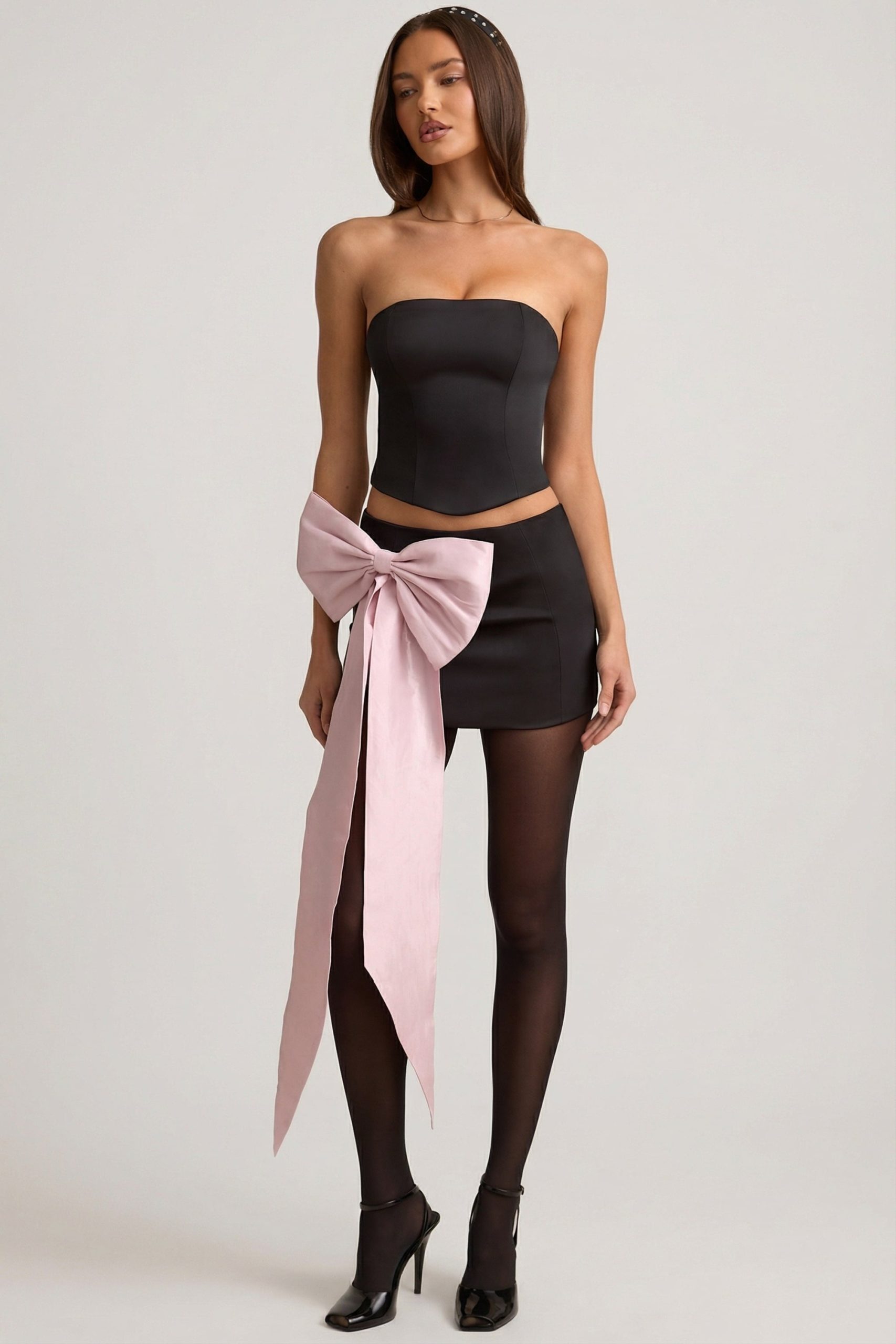 Satin Bow-Detail Low-Rise Mini Skirt in Black - Image 6