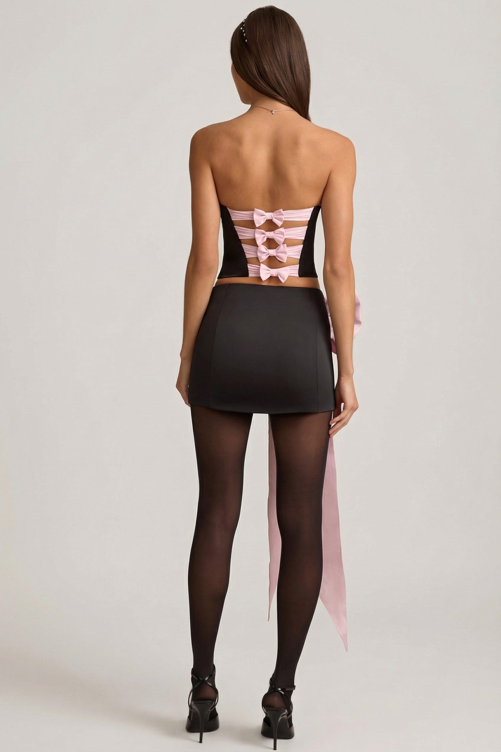 Satin Bow-Detail Low-Rise Mini Skirt in Black - Image 2