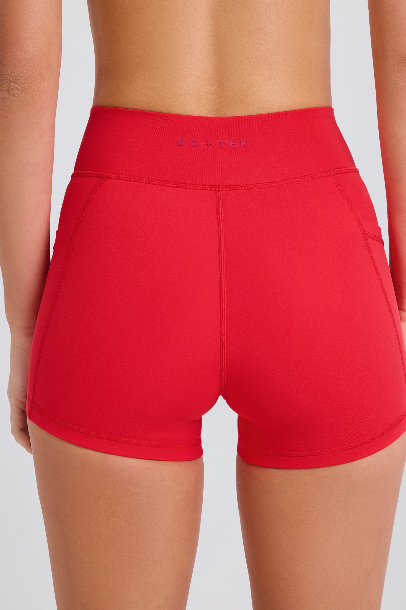 Soft Active Pocket V-Waist Mini Shorts in Strawberry Red - Image 4