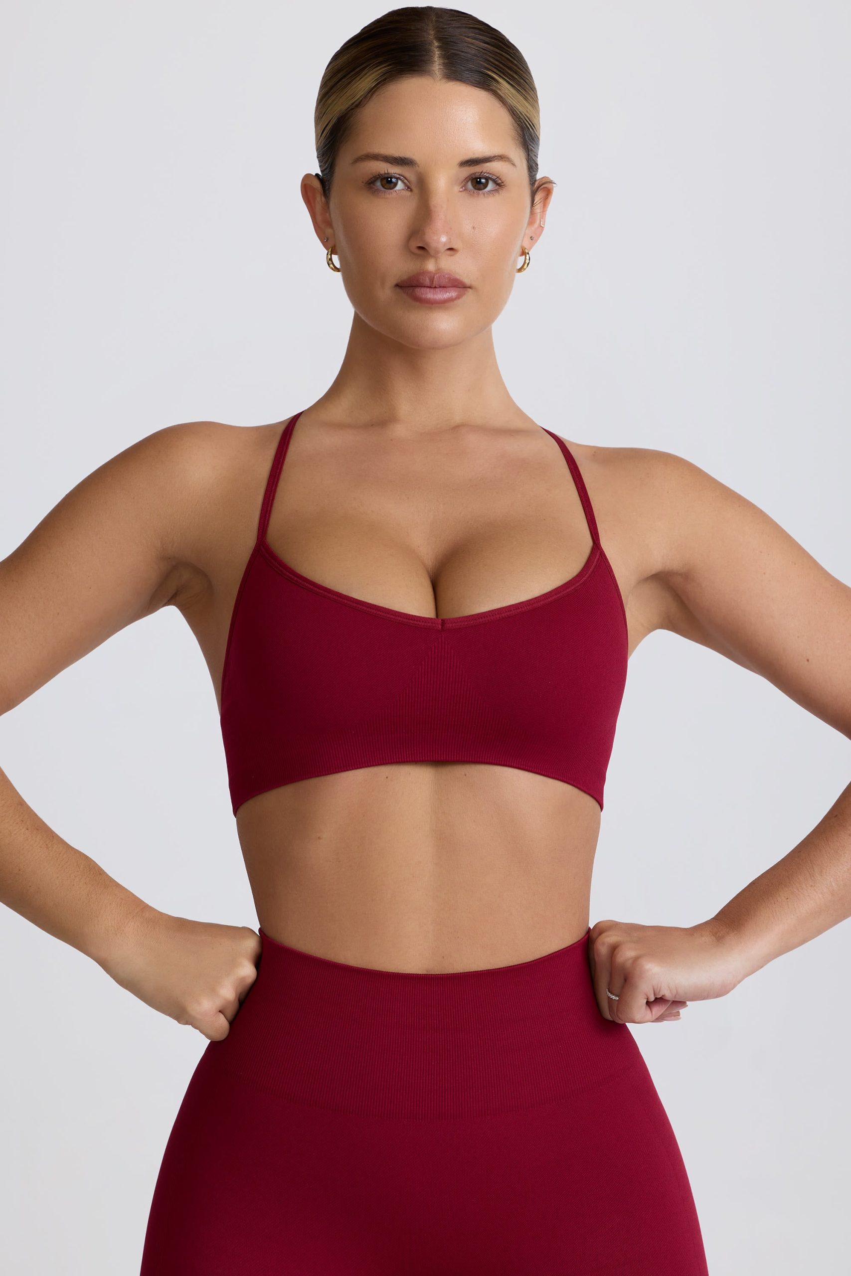 Super Sculpt Seamless Cross-Back Sports Bra in Burgundy - Image 7