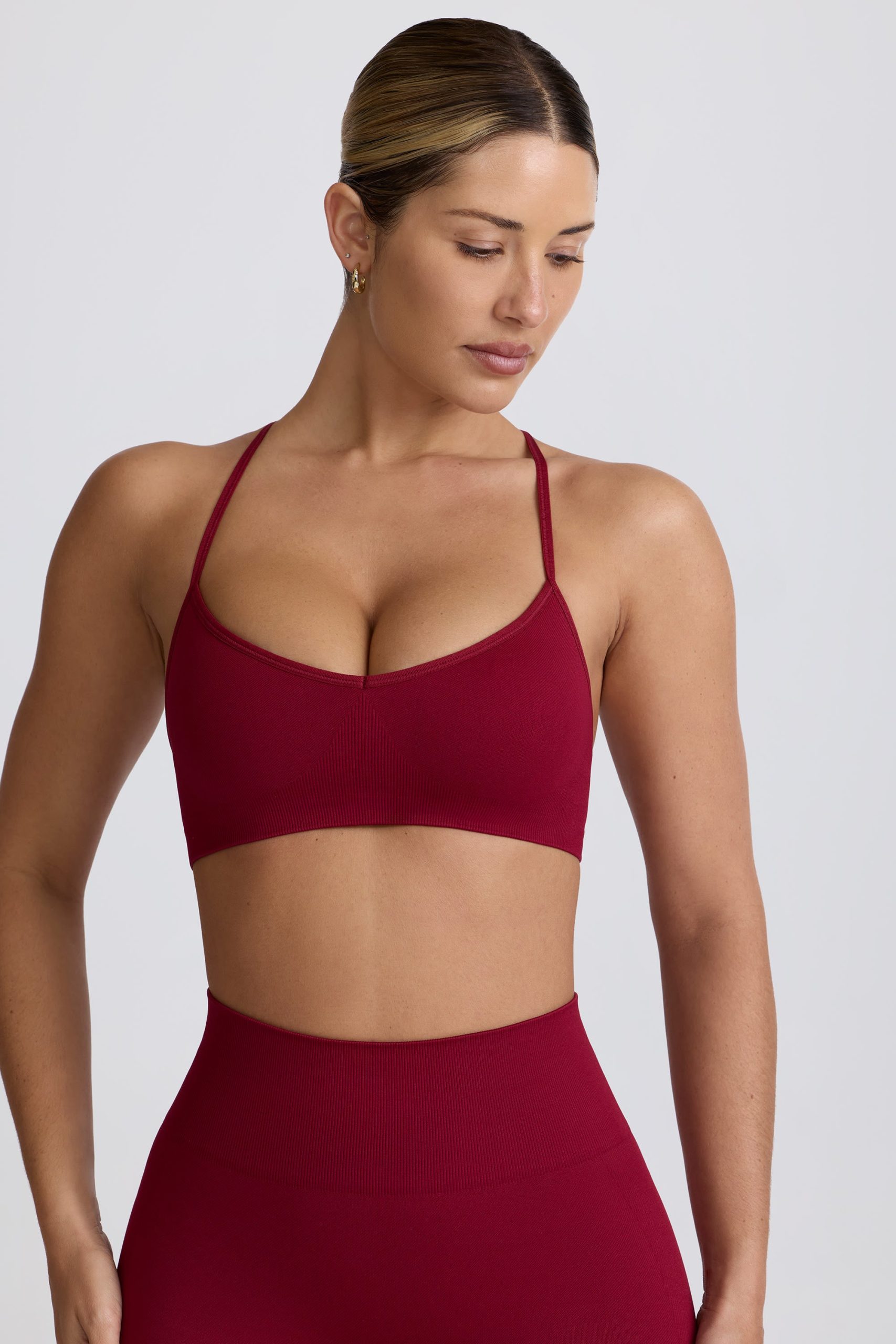 Super Sculpt Seamless Cross-Back Sports Bra in Burgundy - Image 8